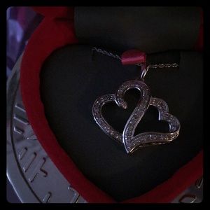 1/2 CTTW diamond necklace set in sterling silver.